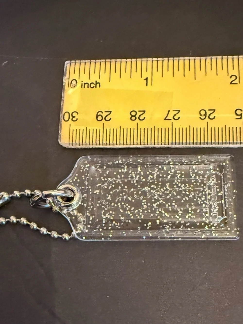Coach Clear Glitter Tag Phone Charm with Silver Tone Chain